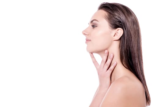 Side pose of pretty nude lady with soft skin