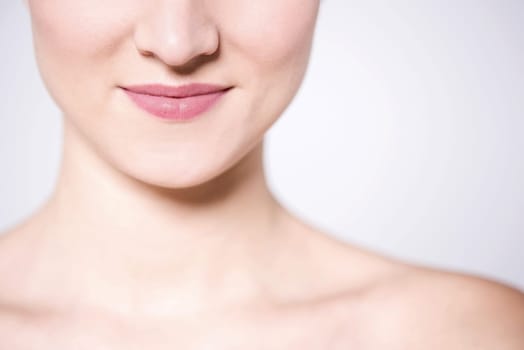 Face close up of a woman, cropped image.