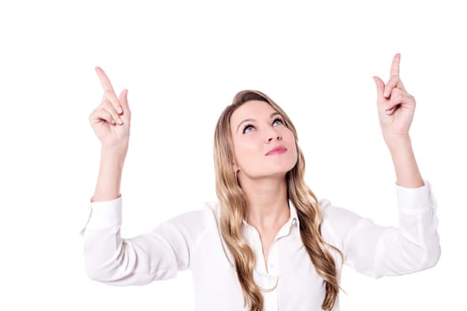 Young woman looking and pointing  upwards