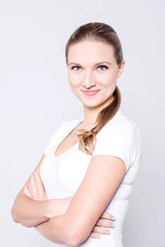 Casual female model posing with arms crossed