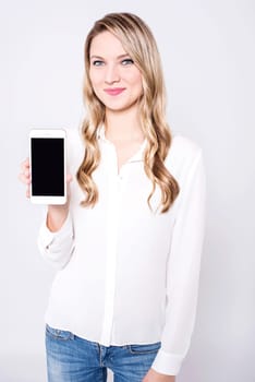 Female model presenting  a new  smartphone