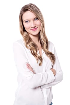 Charming young woman with folded arms