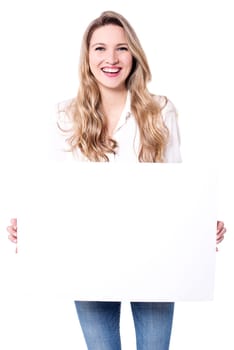 Portrait of woman holding whiteboard