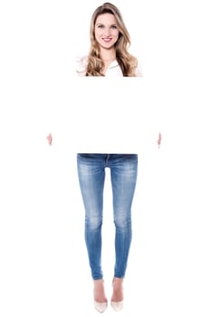 Full length shot of woman showing whiteboard