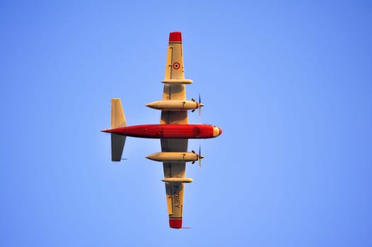 Tracker water bomber in the sky of southern France from extinguishing a forest fire.