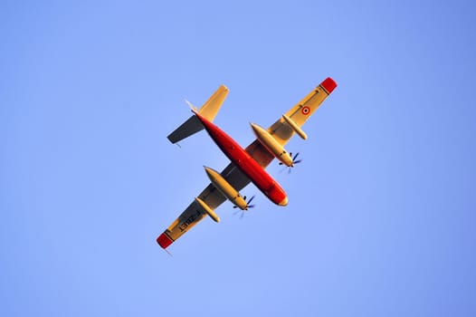 Tracker water bomber in the sky of southern France from extinguishing a forest fire.