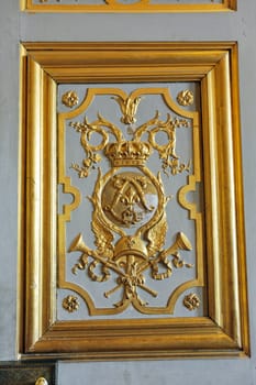 Gilded with fine gold paneling castle of Versailles