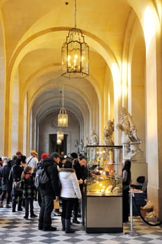 Tourists at the souvenir shop in the castle of Versailles