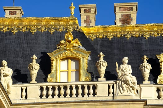 chateau de Versailles, architectural detail and gilding of the facade and roof