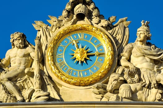 Versailles castle clock lying in the marble courtyard above the King's Chamber sun, Louis XIV