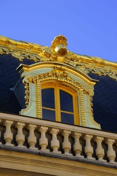 Castle of Versailles, architectural detail and gilding of the facade and roof