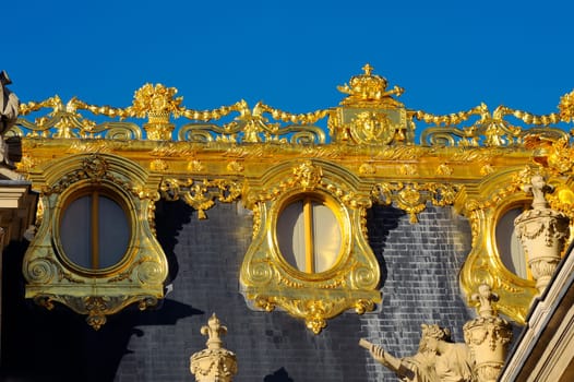 Castle of Versailles, architectural detail and gilding of the facade and roof