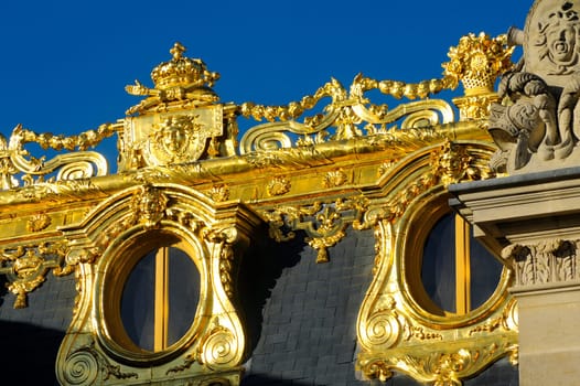 Castle of Versailles, architectural detail and gilding of the facade and roof