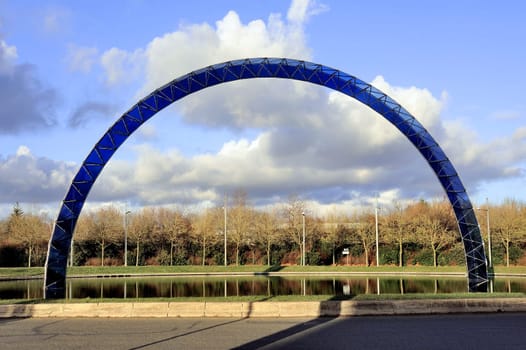 blue arch on a roundabout in Saint-Quentin-en-Yvelines in the Paris region