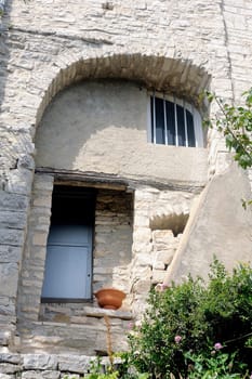 Facade of an old house in the village of Vezenobres in the French department of Gard