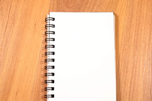 Blank spiral notepad and place for text