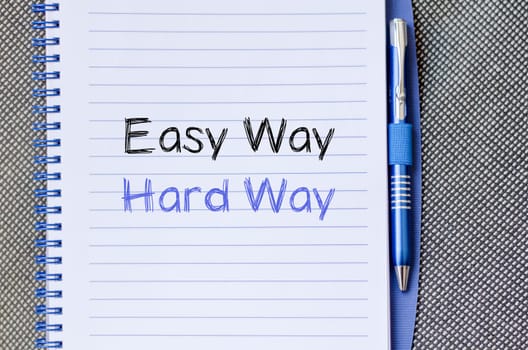Easy way hard way text concept write on notebook