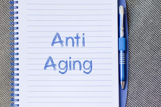 Anti aging text concept write on notebook