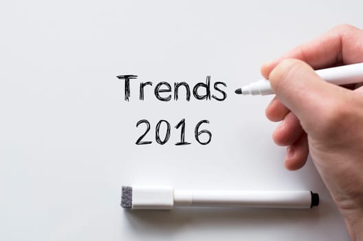 Human hand writing trends 2016 on whiteboard