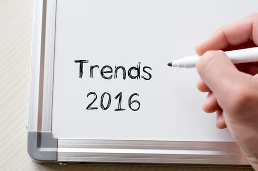 Human hand writing trends 2016 on whiteboard
