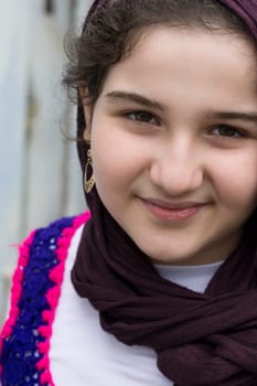 Portrait of Teenage Smiling Beautiful Girl Posing for a Camera