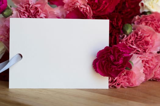 Colorful carnations and greeting card for Valentine's Day, Mother's Day or just because.