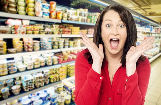Amazed women at supermarket shopping mall store