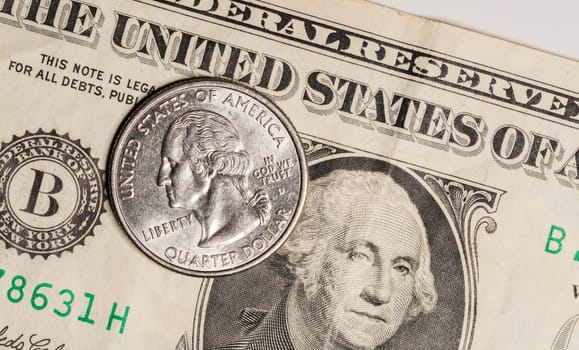 Quarter on US Dollar Bill Close up.