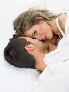 a man and a woman foreplaying in a white background