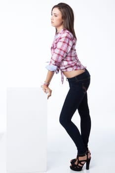 attractive young woman posing in white background