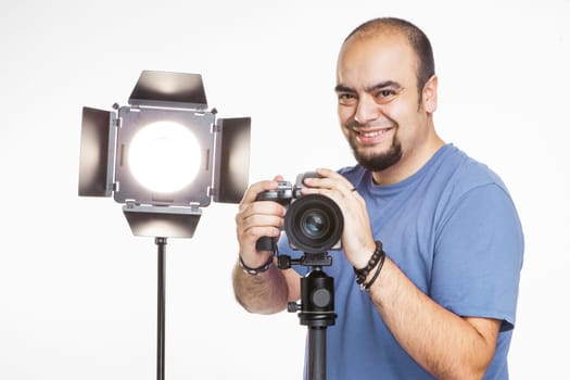 professional photographer in the studio in clear background