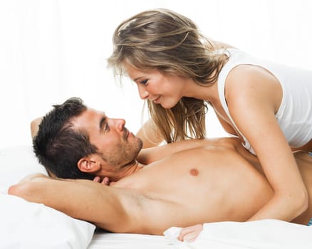 a man and a woman foreplaying in a white background