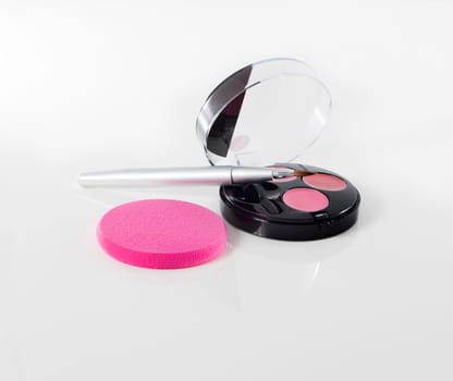 makeup lipstick with brushes isolated on white background