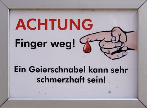 Sign on a cage at the zoo