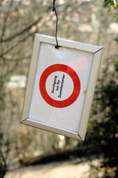 Prohibition sign on a blocked path