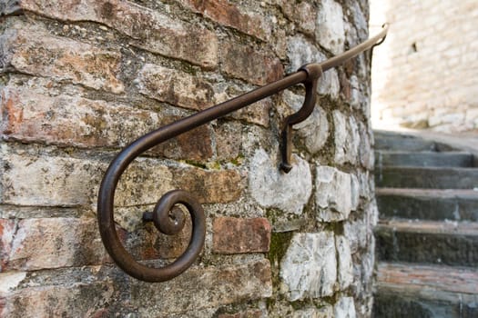 Close up view of an old wrought iron handrail of an Umbrian town