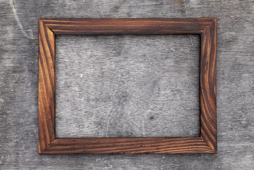 grain wood picture frame on grunge background