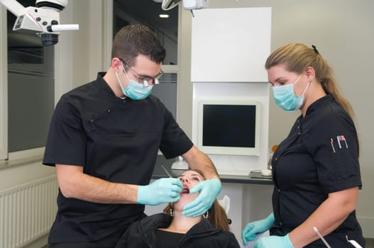 Patient getting a treatment at the dental practice