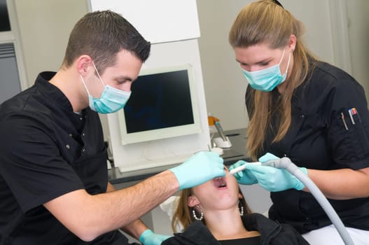 Patient getting a treatment at the dental practice