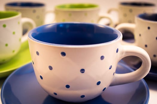 Coffee cups aranged, and ready to be filled with coffee