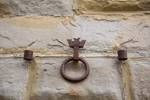 Close-up of an antique ring for tying horses