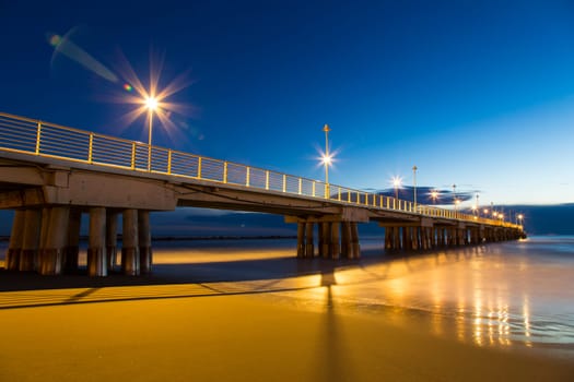 View of a pier marine with lights on and shooting with long time