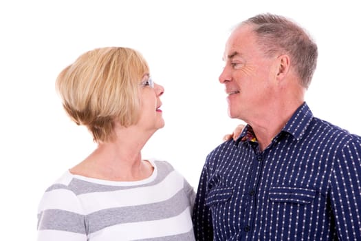 retired couple wearing casual outfits on white isolated background