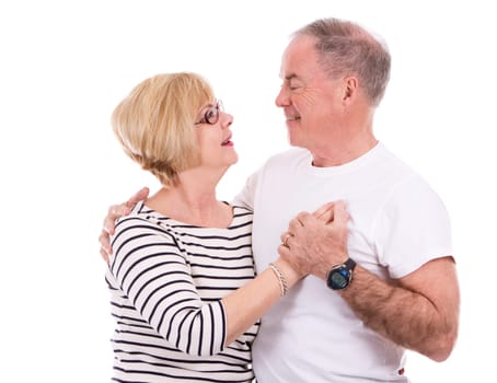 retired couple wearing summer outfits on white isolated background
