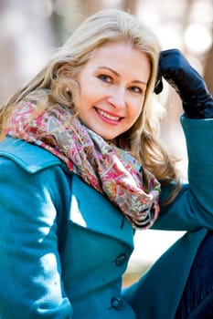 blond casual woman happy outdoors in the woods