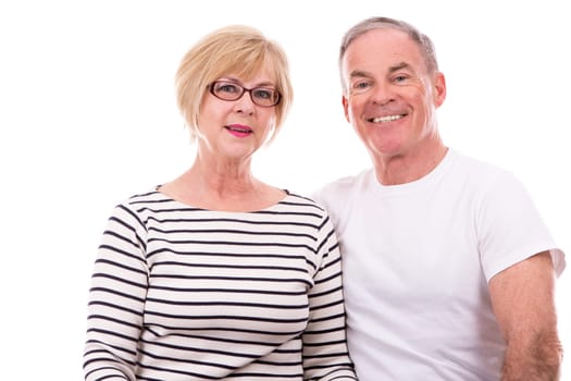 retired couple wearing summer outfits on white isolated background