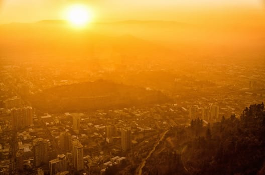 Beautiful golden light of sunset falling on Santiago de Chile