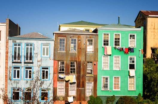 Row of colorful rustic houses in Valparaiso, Chile