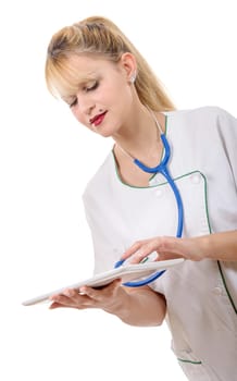 a beautiful nurse holding and using a digital tablet, isolated on white background