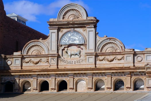 frontage of a building of Kalgoorlie in Australia with low-reliefs